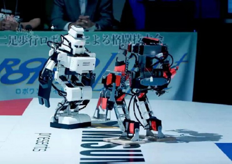 two robots in a small area facing each other